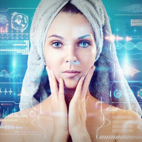 A woman with a towel wrapped on her head touches her face, behind her are futuristic digital data and graphics.